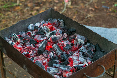 Grill with coals