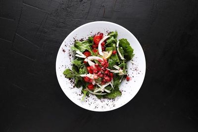 High angle view of salad in bowl on table