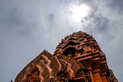 Low angle view of temple building against sky