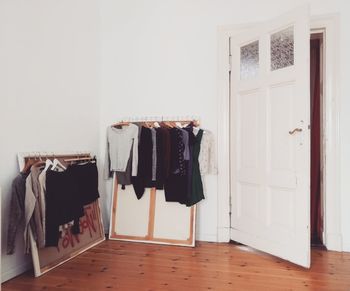 Clothes hanging on floor at home