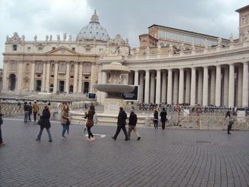 Tourists in front of historical building