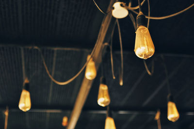 Low angle view of illuminated light bulb