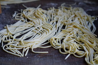 Close-up of uncooked pasta on table