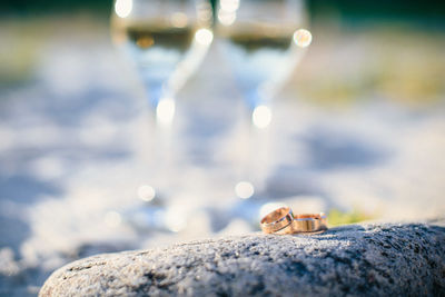 Close-up of crab on rock by sea