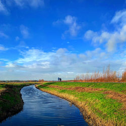 Scenic view of land against sky