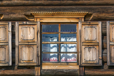 Closed wooden door of old building