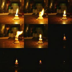 Close-up of lit candle in dark room