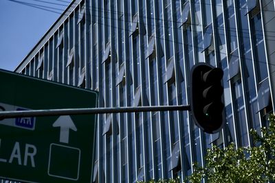 Low angle view of sign against building