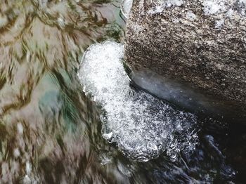 High angle view of rocks in river