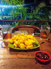 Close-up of fruits on table at home