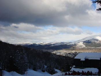 Snow covered mountain against sky