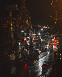 High angle view of illuminated road at night