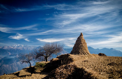 View of landscape against cloudy sky