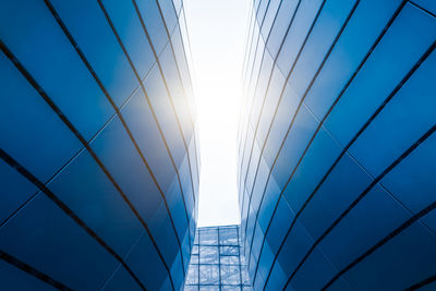 Low angle view of modern buildings against clear sky