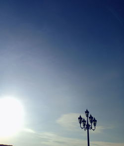 Low angle view of weather against blue sky