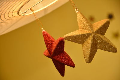 Close-up of hanging over white background