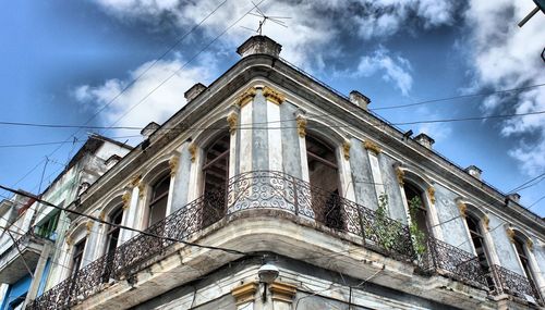 Low angle view of old building against sky