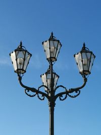 Low angle view of street light against clear sky