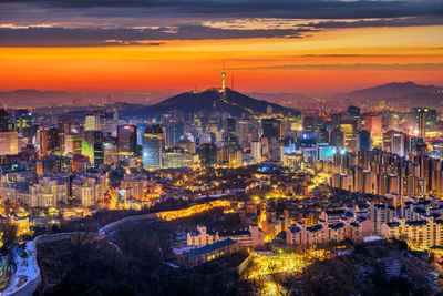 High angle view of city buildings during sunset