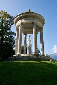 Low angle view of statue against sky