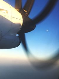 Low angle view of airplane against sky