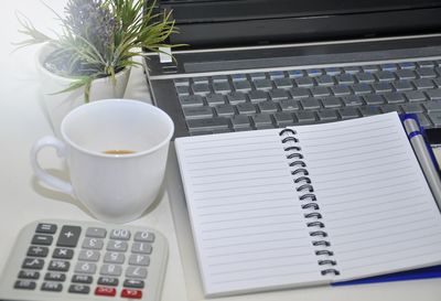 High angle view of coffee cup on table