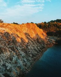 Scenic view of rock formations against sky