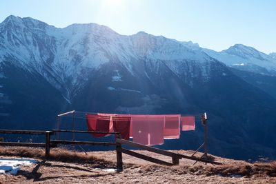 Scenic view of snowcapped mountains against clear sky