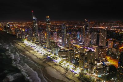 High angle view of illuminated buildings at night