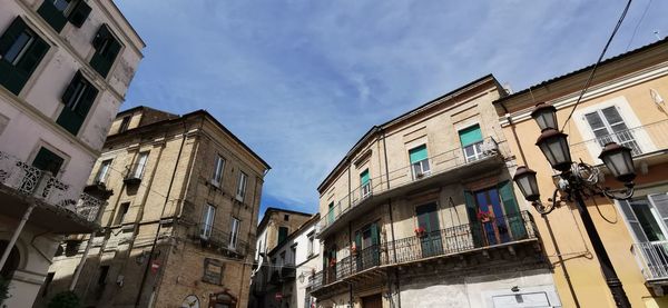 Low angle view of residential buildings against sky