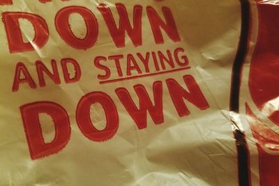 Close-up of text on wall