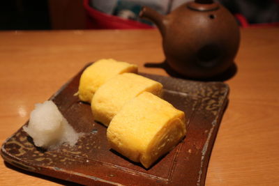 Close-up of ice cream on cutting board