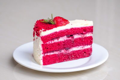 Close-up of strawberry cake in plate