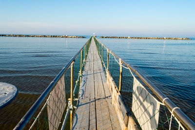 View of bridge over sea against sky