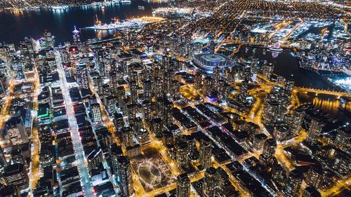 High angle view of illuminated city at night