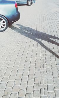 High angle view of bicycle on cobblestone street