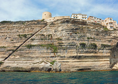 View of bonifacio town in corsica island in france and the lon stairway on the rock