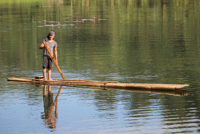 Man standing in lake