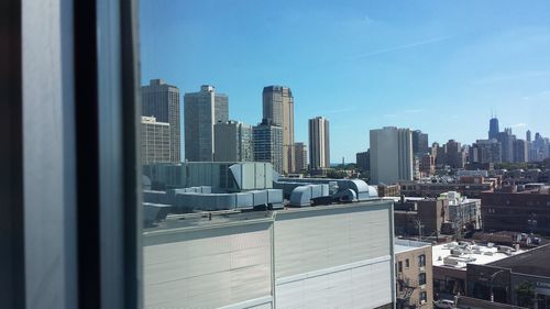 View of cityscape against clear sky