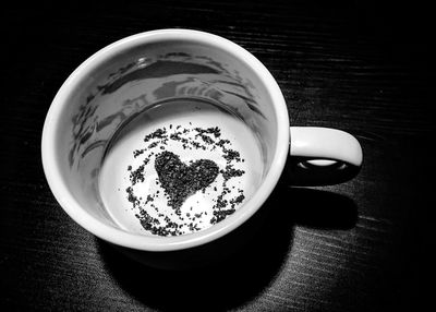 Close-up of coffee cup on table