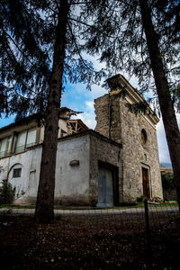 Low angle view of old building against sky