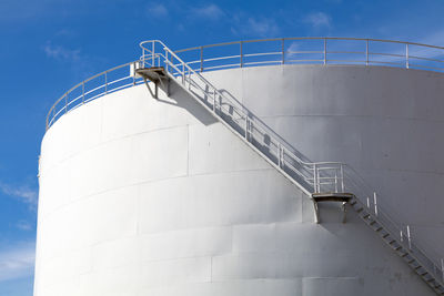 Low angle view of silo against sky