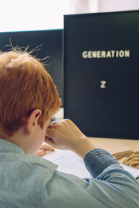 Portrait of boy looking at home