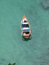 High angle view of boat floating on sea