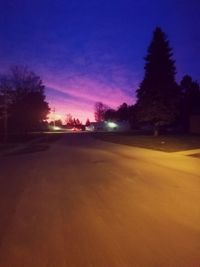 Scenic view of silhouette trees against sky at sunset