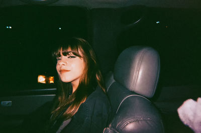 Portrait of young woman looking away