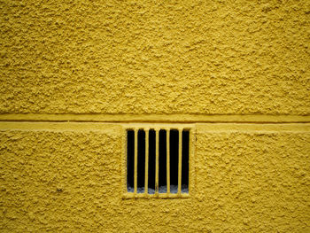 Close-up of wall with metal stripes 
