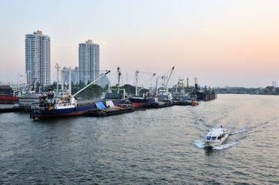 High angle view of yacht sailing in chao phraya river at sunset