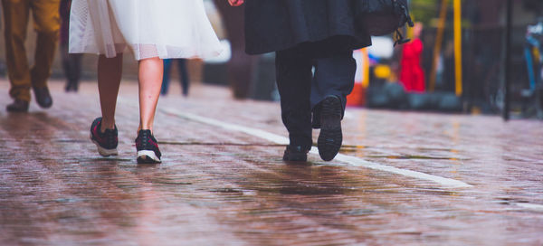 Low section of people walking outdoors