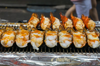 High angle view of meat on barbecue grill